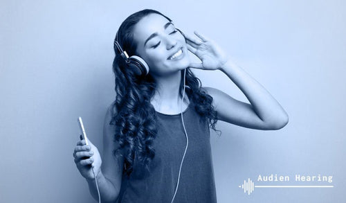 Image of women enjoying the ability to listen to music again